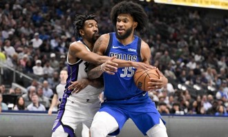 阿丘瓦29+12马绍尔36+10+6 国王战胜独行侠